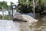 A car in flood water in Ballina