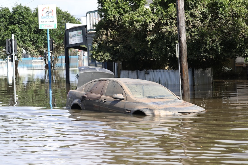 A car in flood water in Ballina