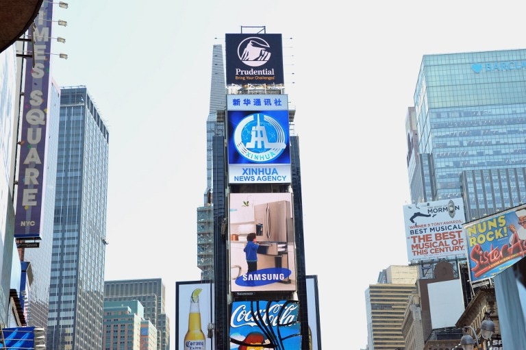 Xinhua news agency leases billboard in Times Square.
