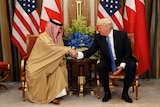 Donald Trump shakes hands with Bahrain's King Hamad bin Isa Al Khalifa.