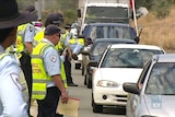 ACT Police line up alongside cars at a random breath test