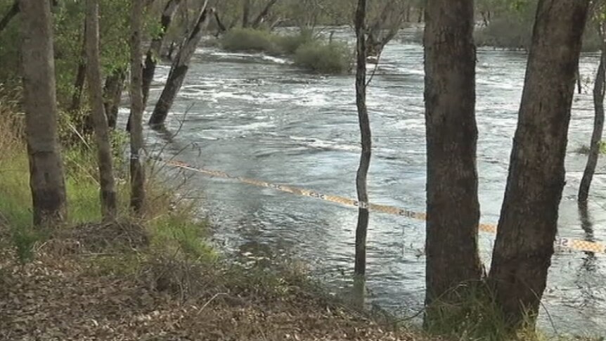 SES tape along a section of the Blackwood River.
