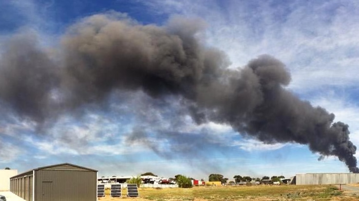 Smoke from an oil depot blaze at Wingfield in northern Adelaide