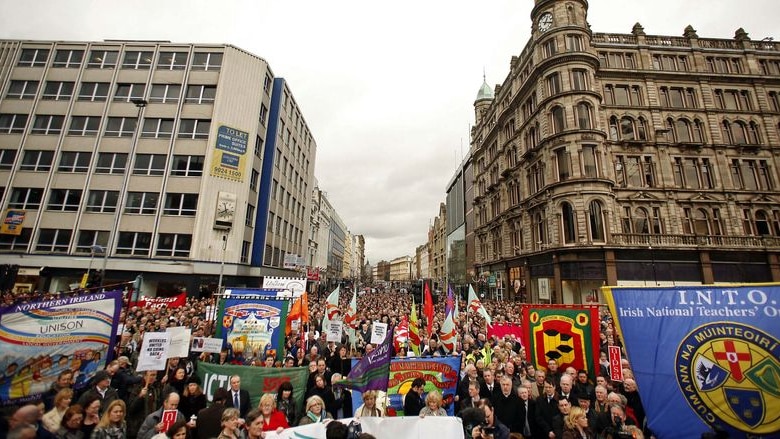 Demonstrators attend a rally organised in protest at the recent killings carried out by republican dissidents, in Belfast, Northern Ireland on March 11, 2009.