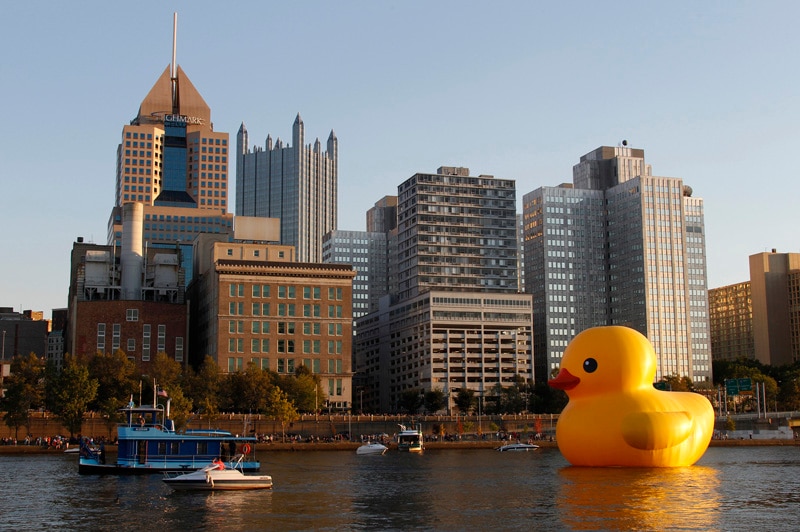 Rubber Ruck by Dutch artist Florentijn Hofman, is towed up the Allegheny River in Pittsburgh, Pennsylvania on September 27, 2013.