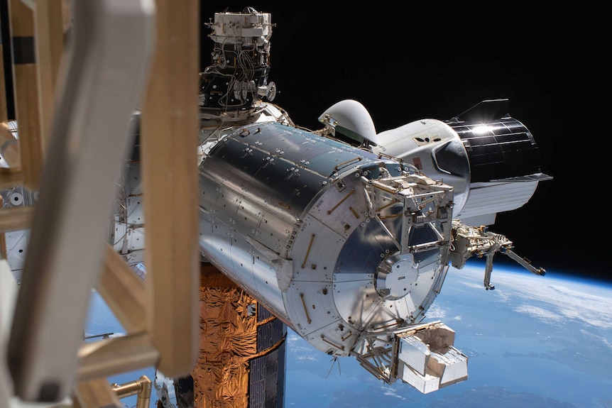 A SpaceX capsule docked with the International Space Station.