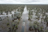 A drone image of a road underwater in rural NSW