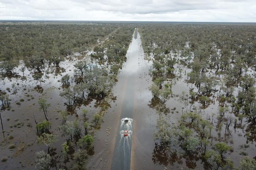 A drone image of a road underwater in rural NSW