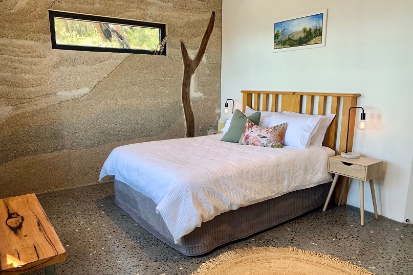 The bedroom of a house made of hemp