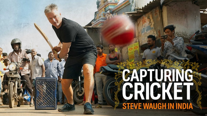 Steve Waugh about to hit a cricket ball with a cricket ball in hand and wicket in the back, surrounded by Indian locals