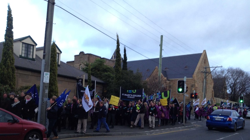 Striking Catholic school teachers rally in Hobart last month.