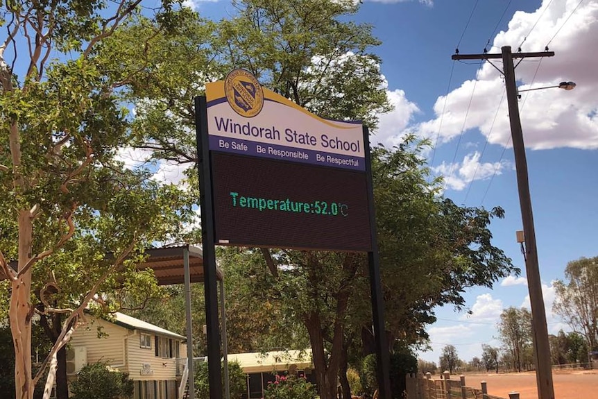 Sign at Windorah State School in Queensland showing the town was 52 degrees Celsius.