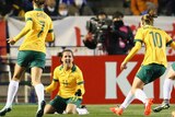 Matildas celebrate scoring their first goal against Japan