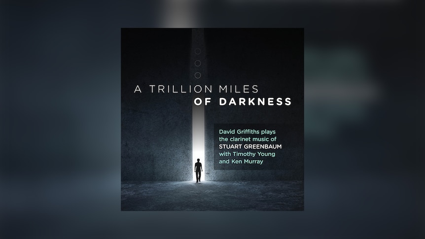 Album cover with the text 'Stuart Greenbaum: A Trillion Miles of Darkness' with man standing in the darkness.