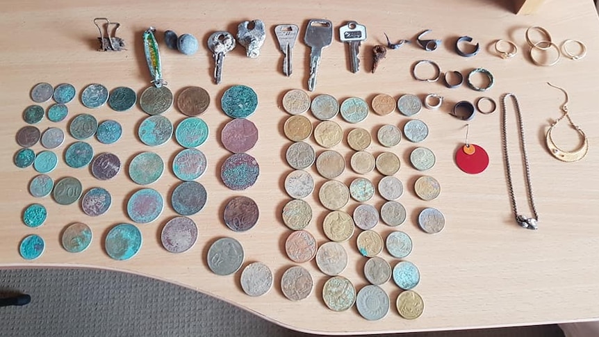 A selection of items found by amateur detectorist Murray Beattie after Cyclone Oma