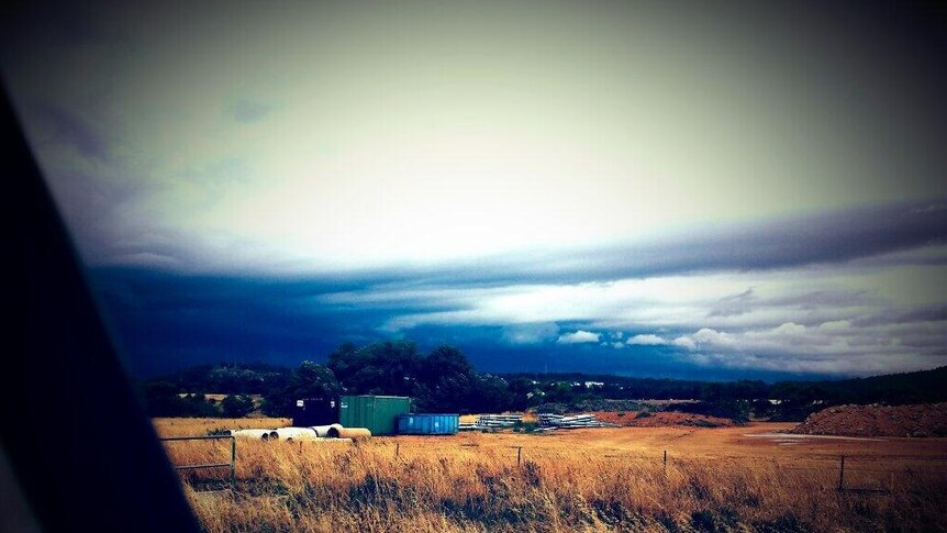 The first of three storm cells rolls in over Canberra.