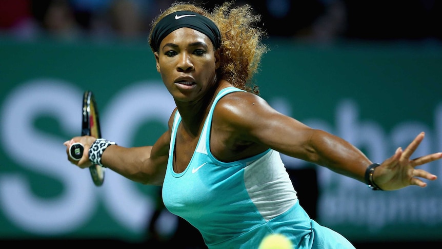 Serena Williams returns against Halep