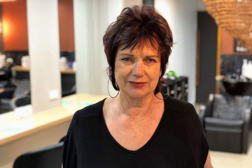 Broadbeach salon owner Ronda Russell stands in her shop on Queensland's Gold Coast on April 8, 2018