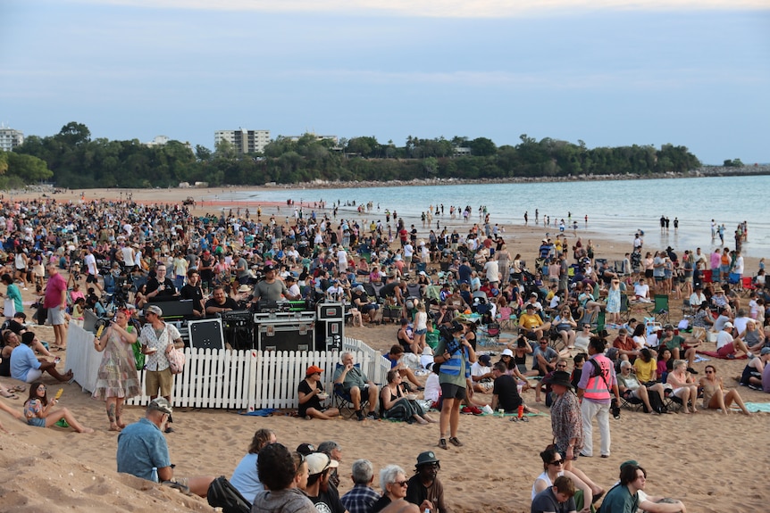 A large crowd gathered at a beach in Darwin