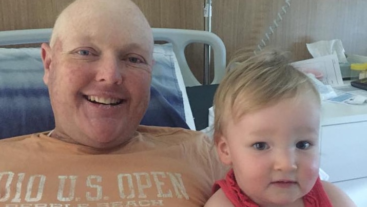 Jarrod Lyle with his daughter Jemma in hospital
