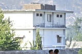 Soldiers guard bin Laden's compound