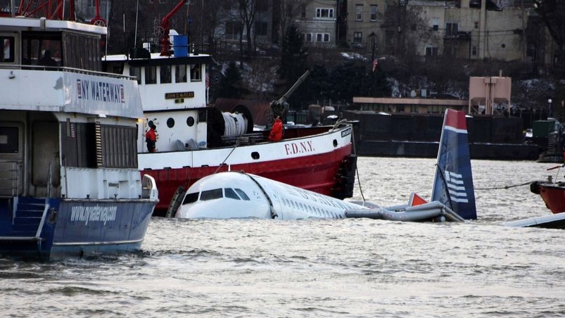 Rescue boats surround a US Airways plane as it floats in the Hudson River