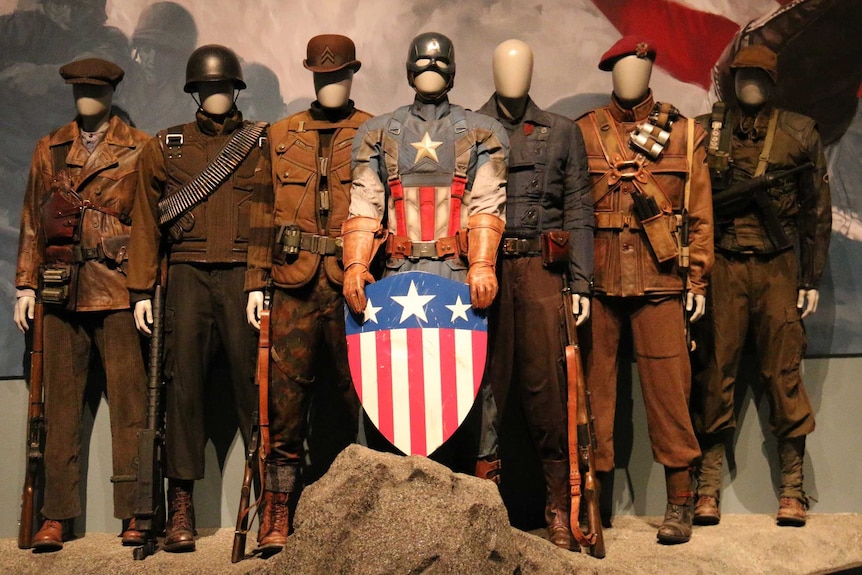 Large-scale diorama featuring Captain America from the 2011 film standing alongside other soldiers