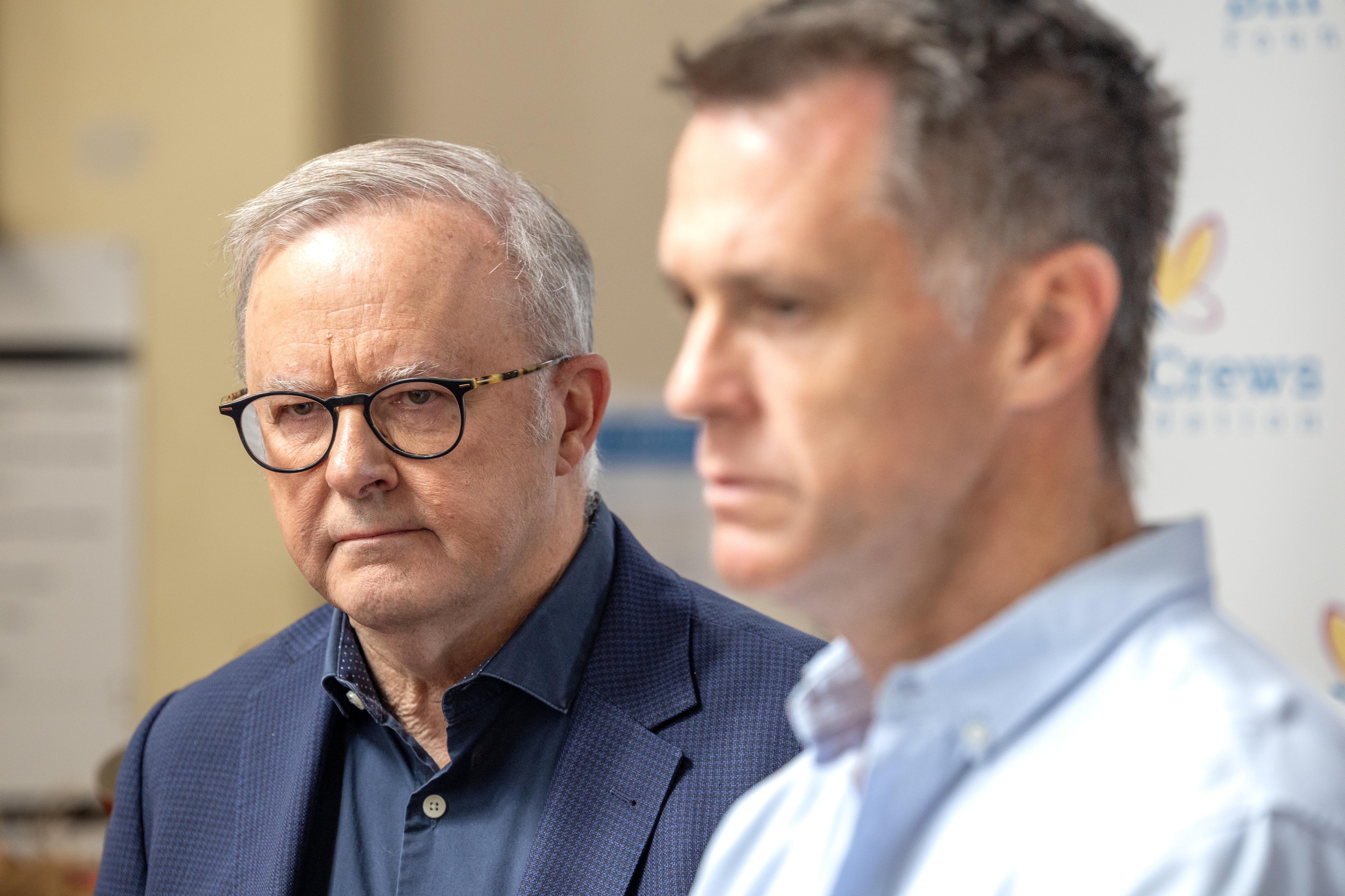 Teenager charged over alleged online threats to kill PM, NSW premier