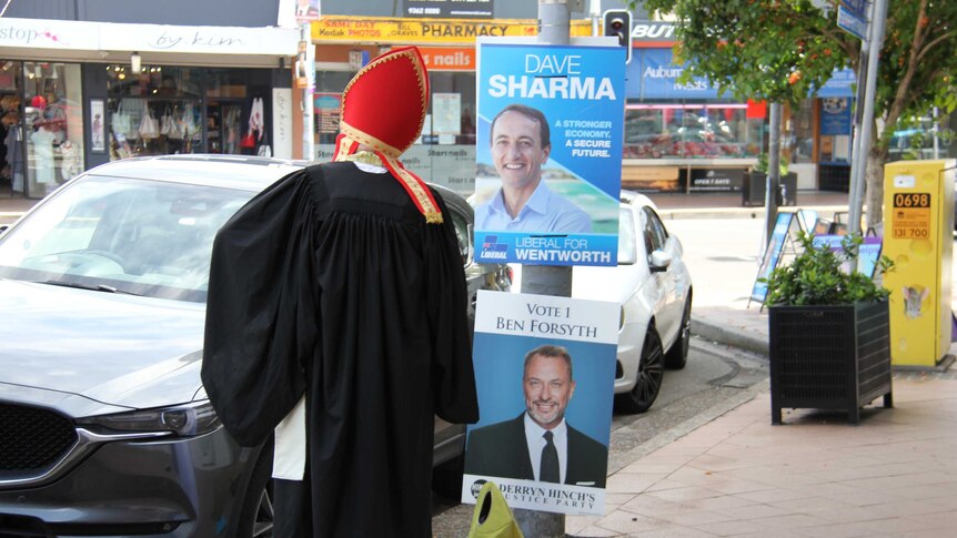 SAS Story: Priest outside Rose Bay pre-polling booth