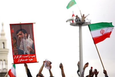 Supporters of Iranian President Mahmoud Ahmadinejad celebrate his election win this month