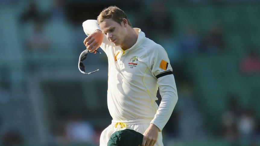 Australia's Steve Smith reacts on day five of the third Test against India at the MCG.