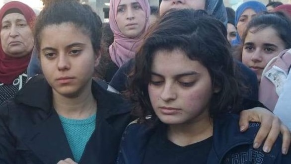 Noura Maasarwe (left) and Ruba Maasarwe (right) at a vigil for their sister in Israel