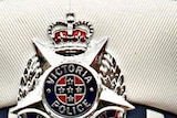 Victoria Police hat and badge.