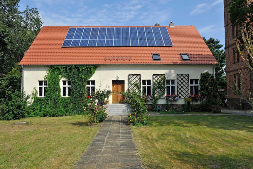 Solar cells on the roof of the Atterwasch rectory, Lusatia, Germany