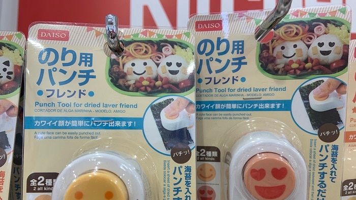 smiling faces on plastic tools used to make Japanese rice balls