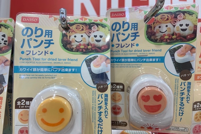 smiling faces on plastic tools used to make Japanese rice balls