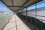A caged hallway inside the Borallon Training and Correctional Centre in Ironbark