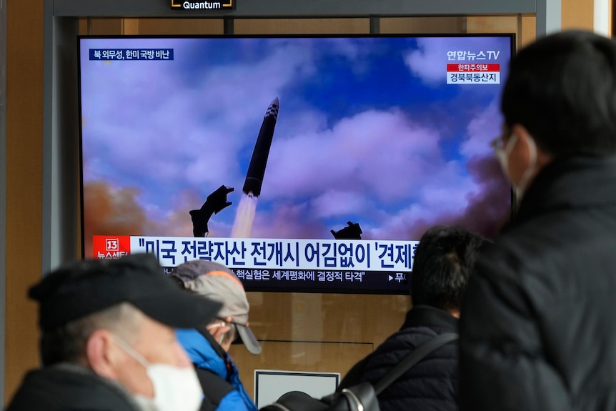 A TV screen shows a file image of North Korea's missile launch during a news program at the Seoul Railway Station on Thursday, February 2, 2023.