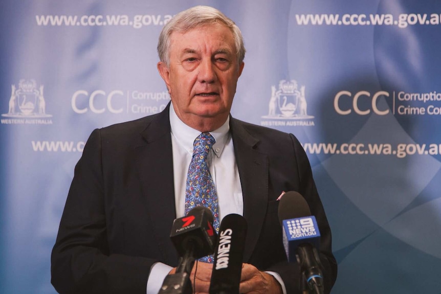 A mid shot of WA Corruption and Crime Commission head John McKechnie talking at a media conference.
