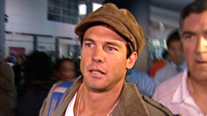 Back home ... Ben Cousins arrives at Perth airport upon his return to Australia
