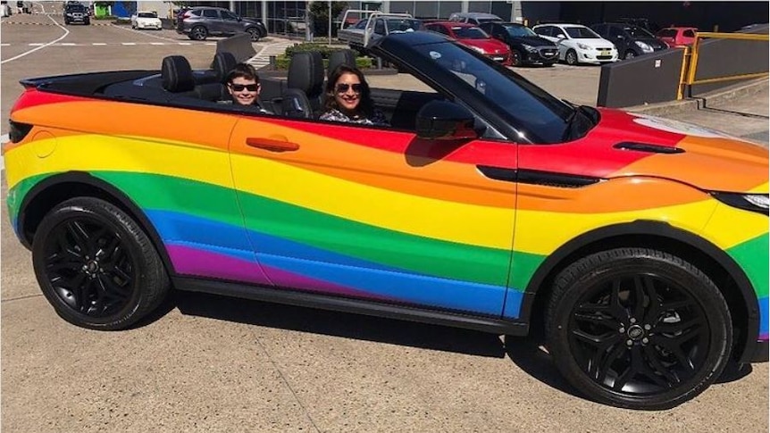 Nama Winston and son Winston in a rainbow car. She has written about how to support LGBTIQ teens