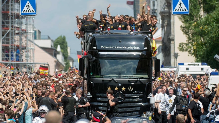 German team celebrates on open top bus
