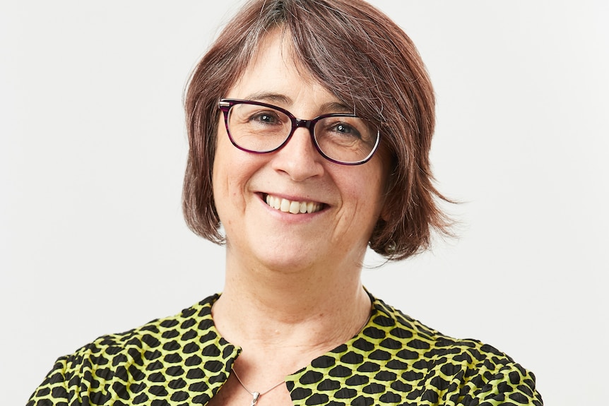 No To Violence CEO Jacqui Watt who is a white middle-aged woman with brown cropped hair in a corporate headshot
