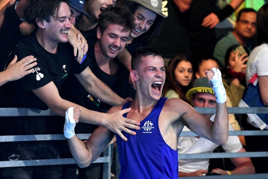 Harry Garside of Australia celebrates with fans