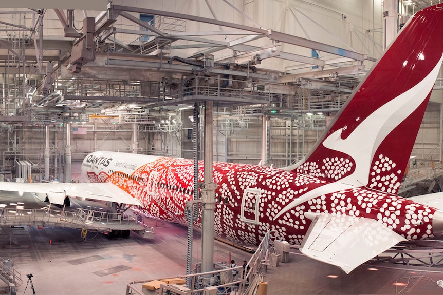 A Qantas dreamliner painted with Aboriginal art