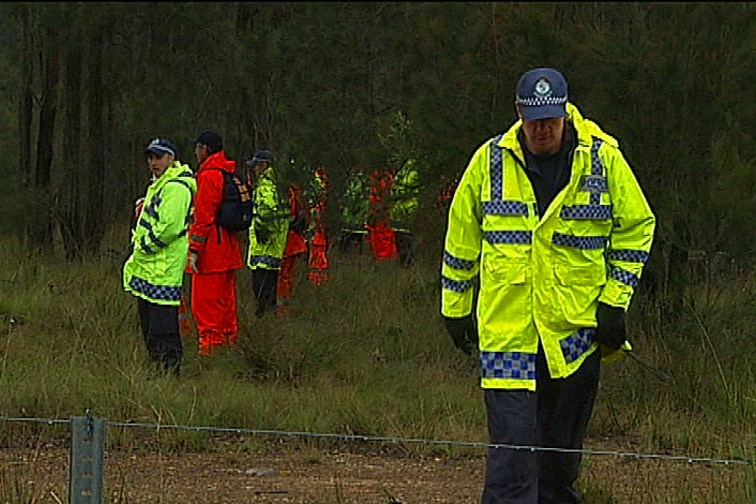 TV STILL: Police search a South Sydney property where human remains have been uncovered.