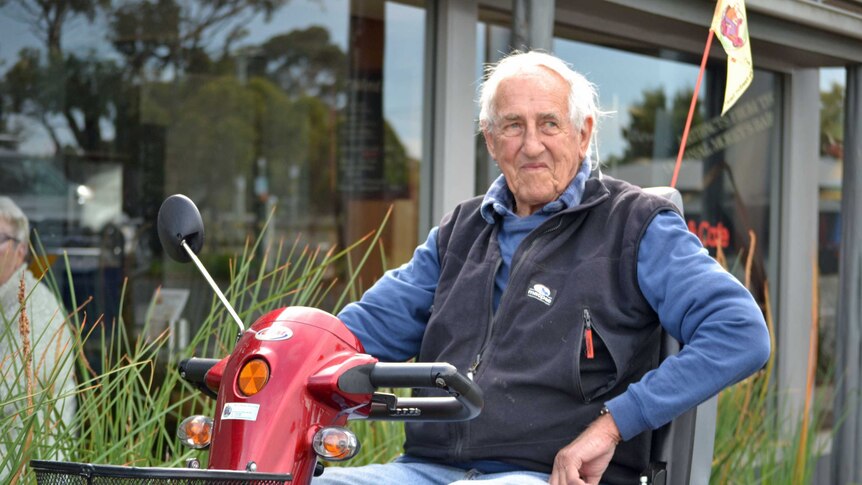 Swansea resident John Austwick on a motorised mobility scooter.