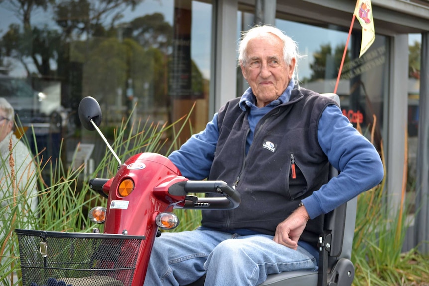 Swansea resident John Austwick on a motorised mobility scooter.