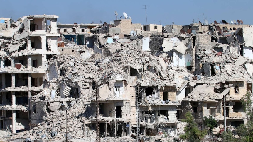 Heavily damaged buildings in the neighbourhood of Bani Zeid