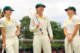Australia Test cricketers Ellyse Perry, Meg Lanning and Alyssa Healy laugh.
